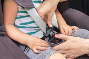 car seat fastening security belt to child